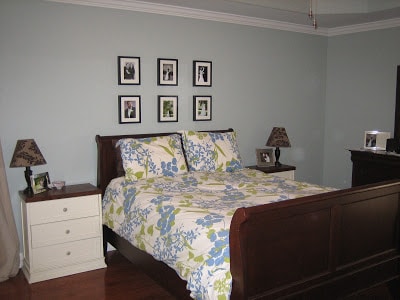 bedroom with too small art above the bed is one of the things that make your home look cheap.