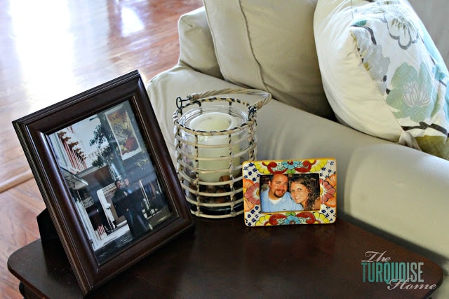Gorgeous Living Room Makeover with beautiful DIY board and batten, Pottery Barn sofa, stenciled curtains, warm wood and pops of turquoise!