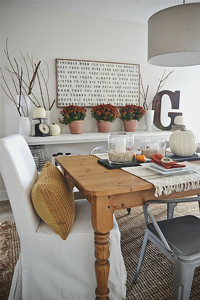 Use simple items like branches and twigs to add nature to your fall home decor! Click for more fall decorating ideas! | 11 Ways to Add Fall to Your Home