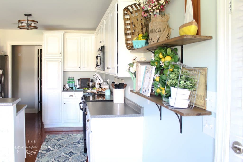 Gorgeous Sea Salt by Sherwin Williams on the kitchen walls and Simply White by Benjamin Moore on the cabinets
