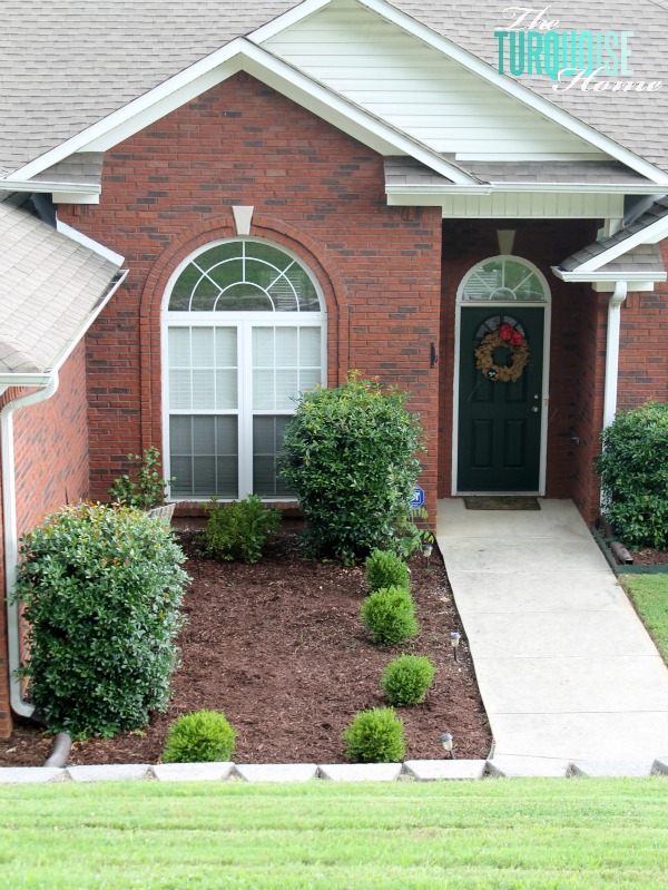 Mulch the front Flower Beds