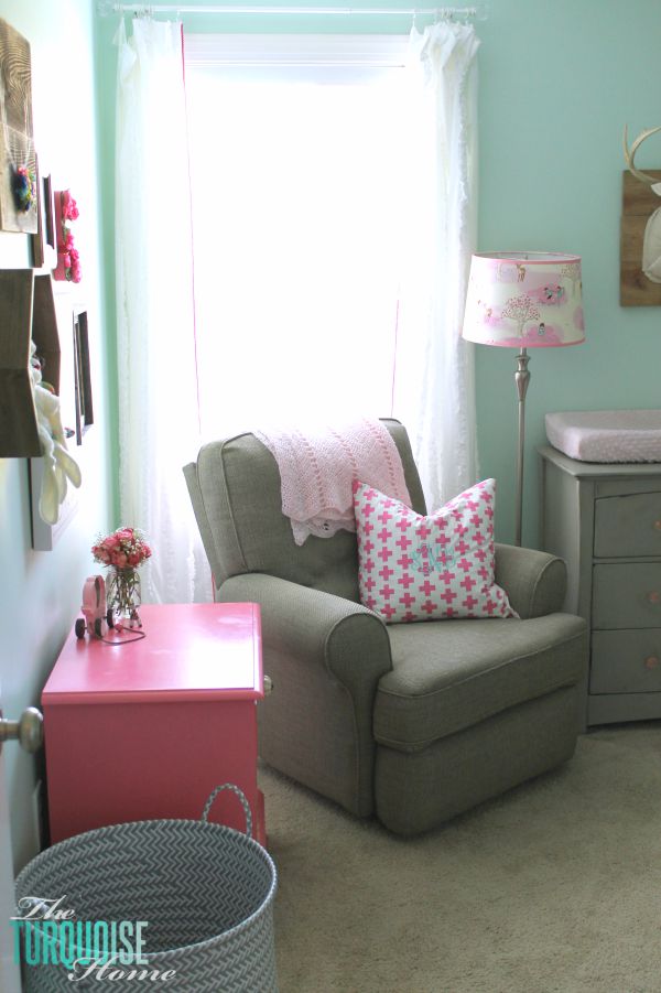 All of the pretty pink and turquoise touches with a woodland theme make a sweet retreat for any little girl. | Baby Girl's Woodland Nursery | All the details at TheTurquoiseHome.com