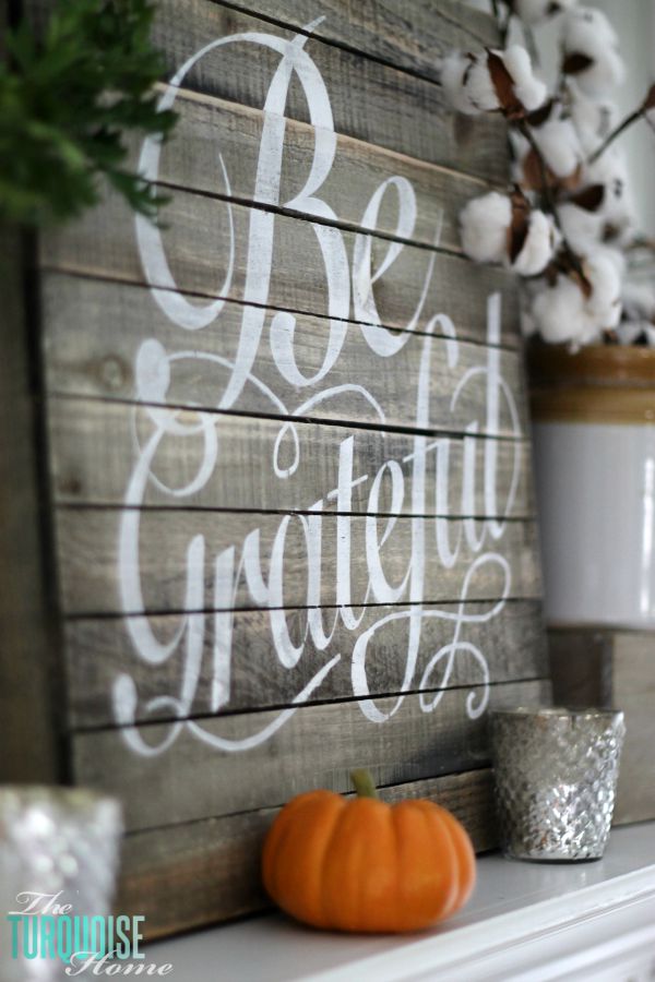 Plaids, neutrals and a few pops of autumnal color bring this message of gratitude home. I love the sweet reminder to be grateful this season - and always! | Grateful Fall Mantel | Details at TheTurquoiseHome.com