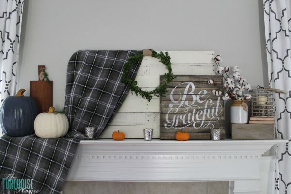 Plaids, neutrals and a few pops of autumnal color bring this message of gratitude home. I love the sweet reminder to be grateful this season - and always! | Grateful Fall Mantel | Details at TheTurquoiseHome.com