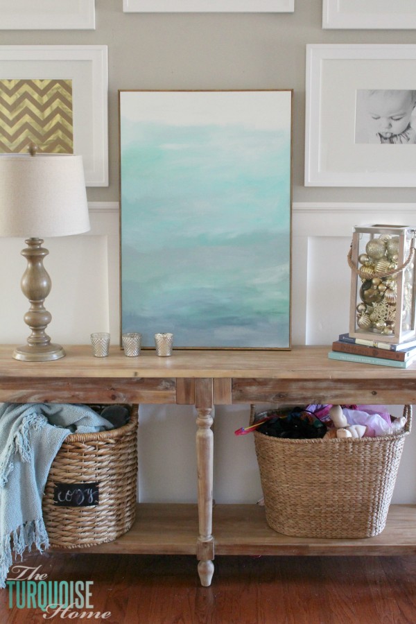 No WAY! This is such an easy (and cheap!) way frame a canvas. It makes a $22 DIY art piece look like it's worth much more!!
