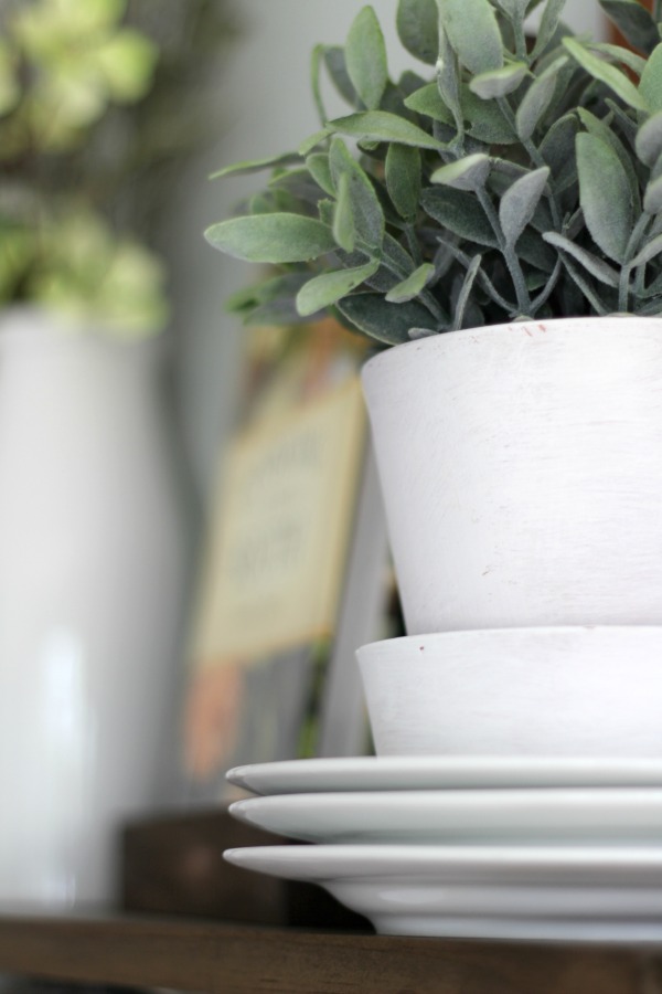 LOVE these tips for styling shelves. These $40 DIY shelves were transformed with some old and new farmhouse decor. | TheTurquoiseHome.com