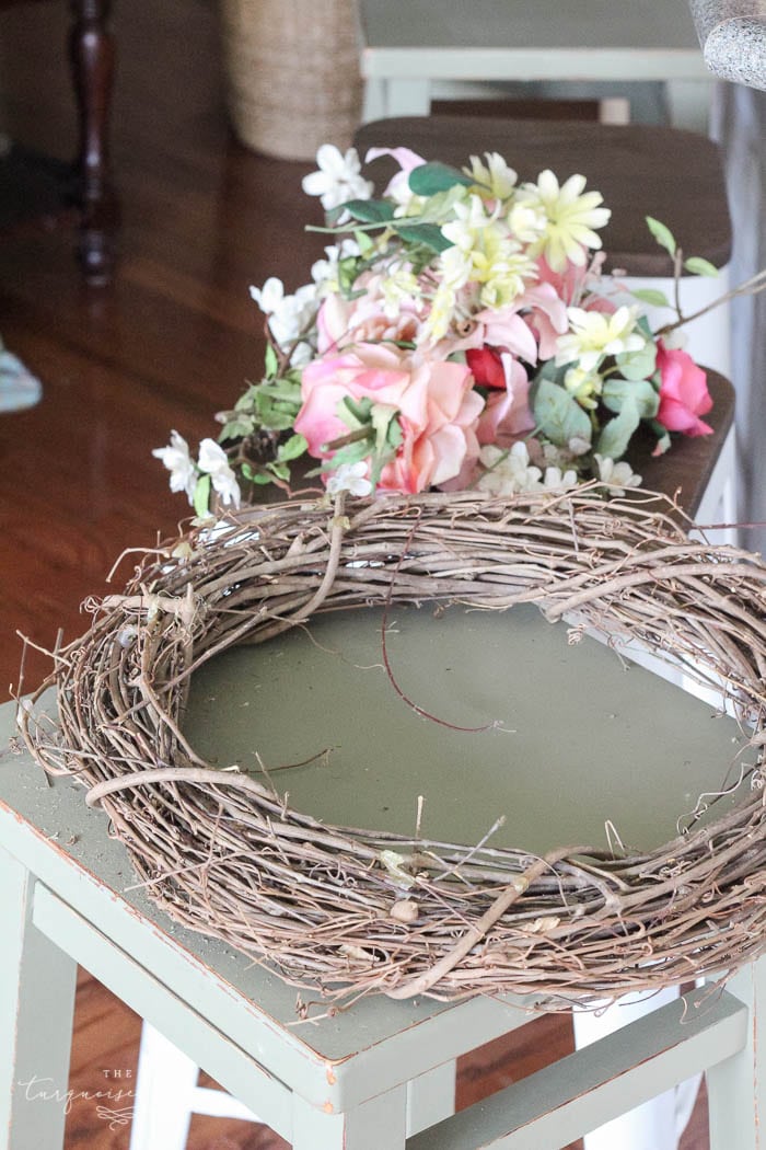 Use a new or recycled grapevine wreath for your DIY fall wreath. I recycled an old wreath from my wedding.