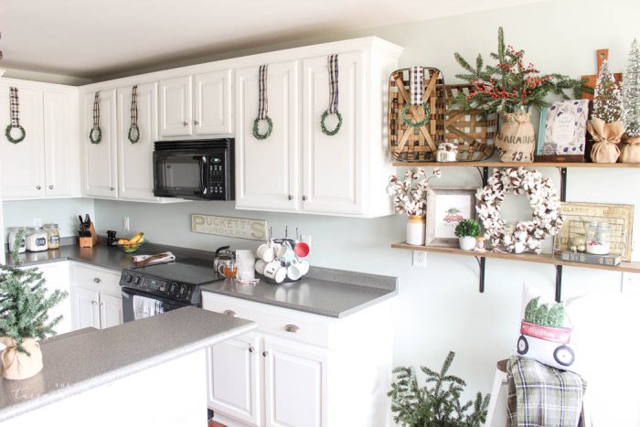 Gorgeous farmhouse shelves all decorated for Christmas and Kitchen Decor with DIY Christmas Kitchen Wreaths!