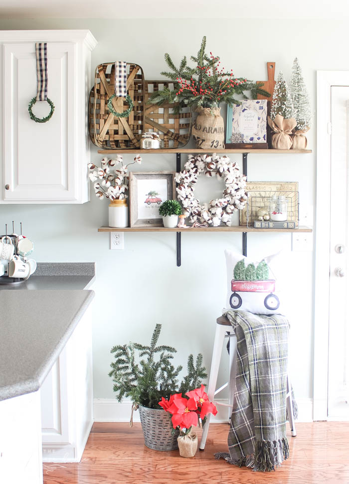 Gorgeous farmhouse shelves all decorated for Christmas and Kitchen Decor with DIY Christmas Kitchen Wreaths!