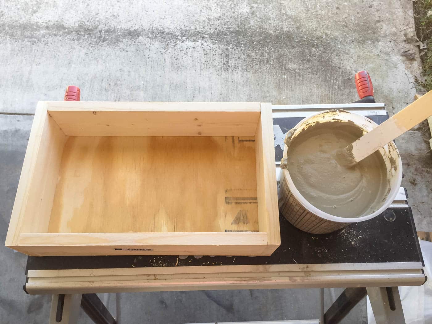 mixed concrete to make a tray.