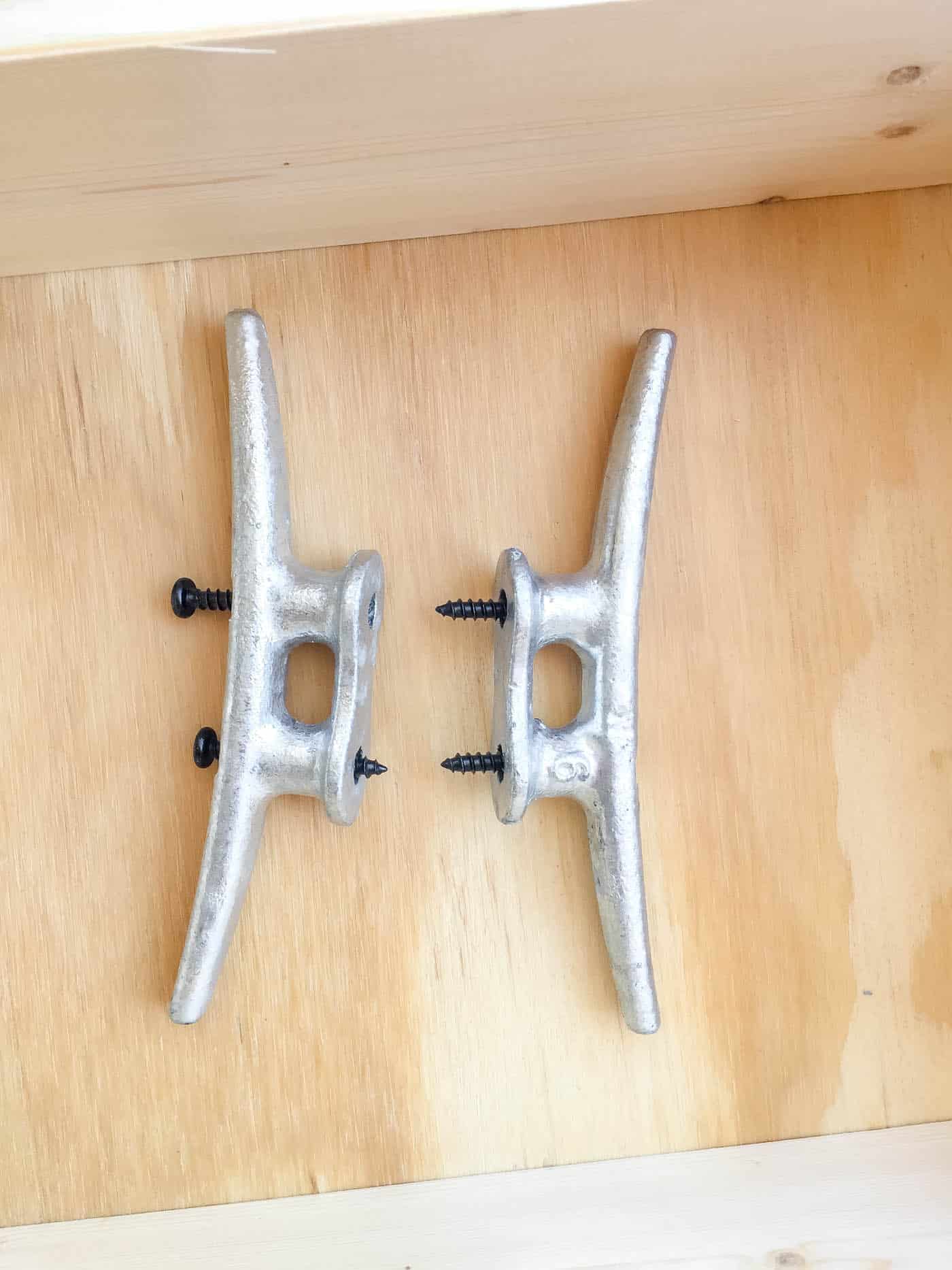 attach the screws to the dock cleats.