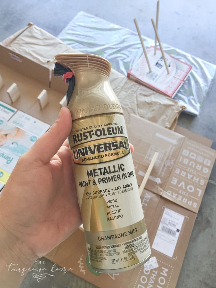 I sprayed down my Ikea Spice Racks with champagne mist spray paint to make the cutest (and cheapest!) bookshelves!