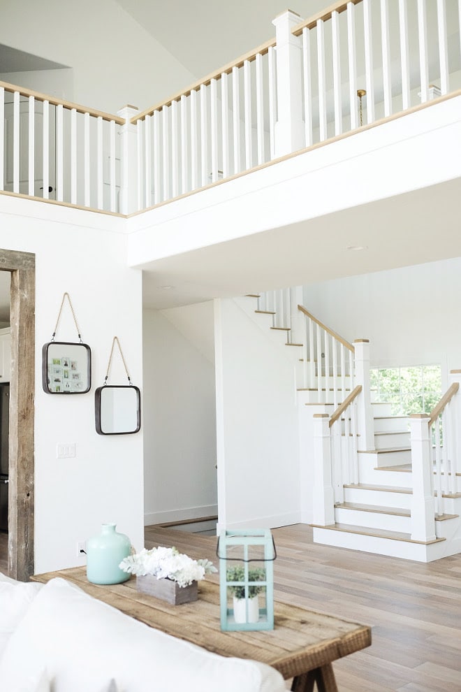 Extra White Paint Color from Sherwin Williams is GORGEOUS in this staircase landing space. LOVE!! | Top Favorite White Paint Colors