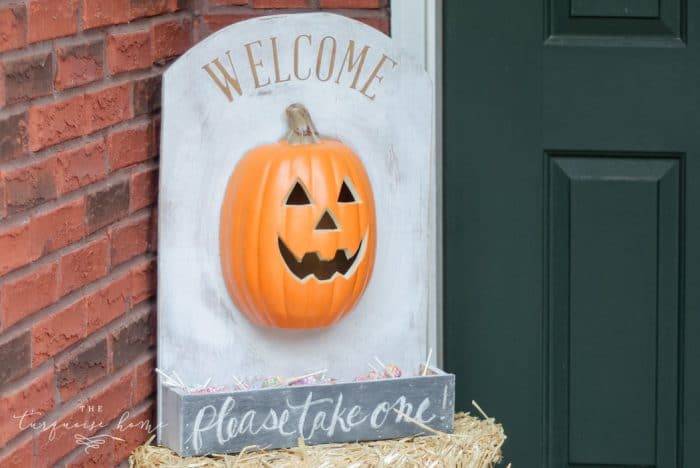 Such a cute option for giving away candy while you're away! DIY Lighted Pumpkin Candy Holder