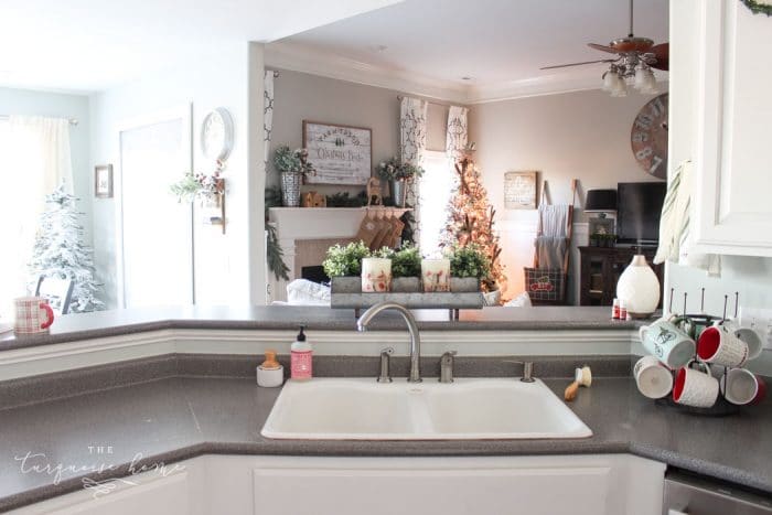 Adorable Farmhouse Christmas Kitchen ... and a real life tale of how this blogger balances motherhood and photo shoots. 🤪