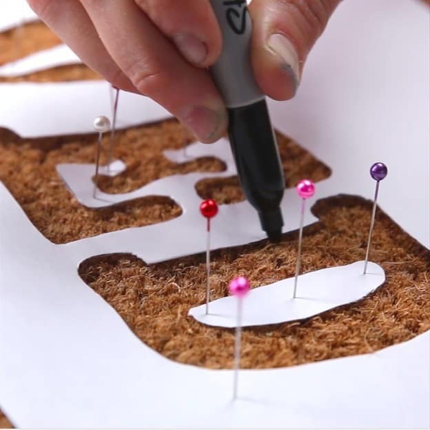 Hold down the stencil with straight pins! | DIY Doormat