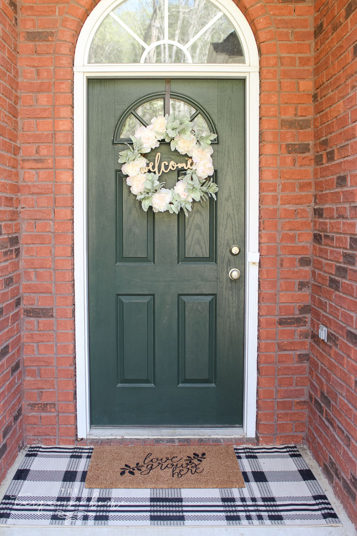 DIY "Love Grows Here" Doormat - easy to customize for cheap!