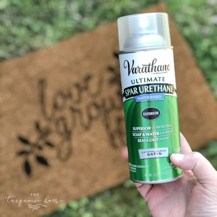 Finish off the DIY doormat by spraying a clear sealer over it!