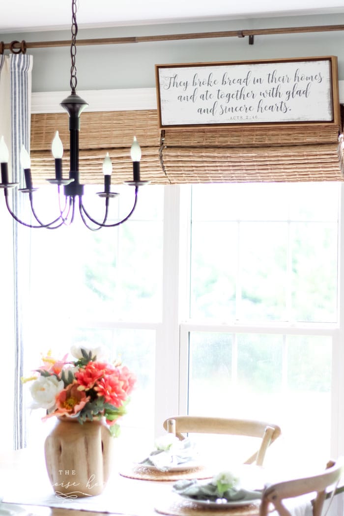 Add beautiful typography to your kitchen with this verse found in Acts 2:46, which says, "They broke bread in their homes and ate together with glad and sincere hearts." | Kitchen Before and After | Kitchen Makeover Ideas | DIY Kitchen Makeover | Kitchen Remodel Before and After