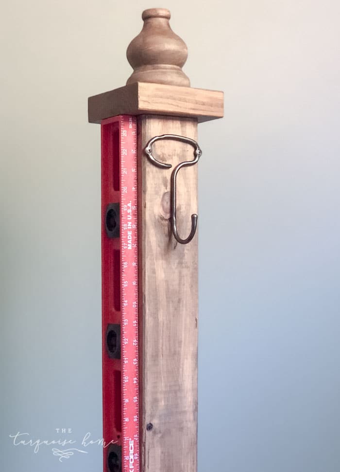 Add decorative hooks to your standing coat rack. | DIY Coat Rack | #buildyourownathome #diyproject #diy #buildlikeagirl