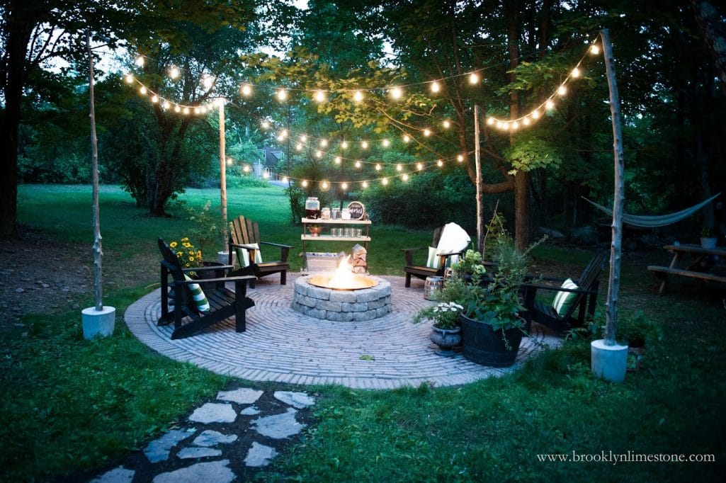 Outdoor Open Concept Fire Pit with string lights