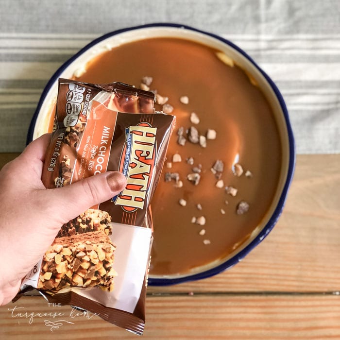 Sprinkle the toffee bits on top of the caramel. | Cream Cheese Caramel Apple Dip Recipe