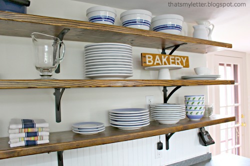 open wood shelving from Jaime Costiglio.