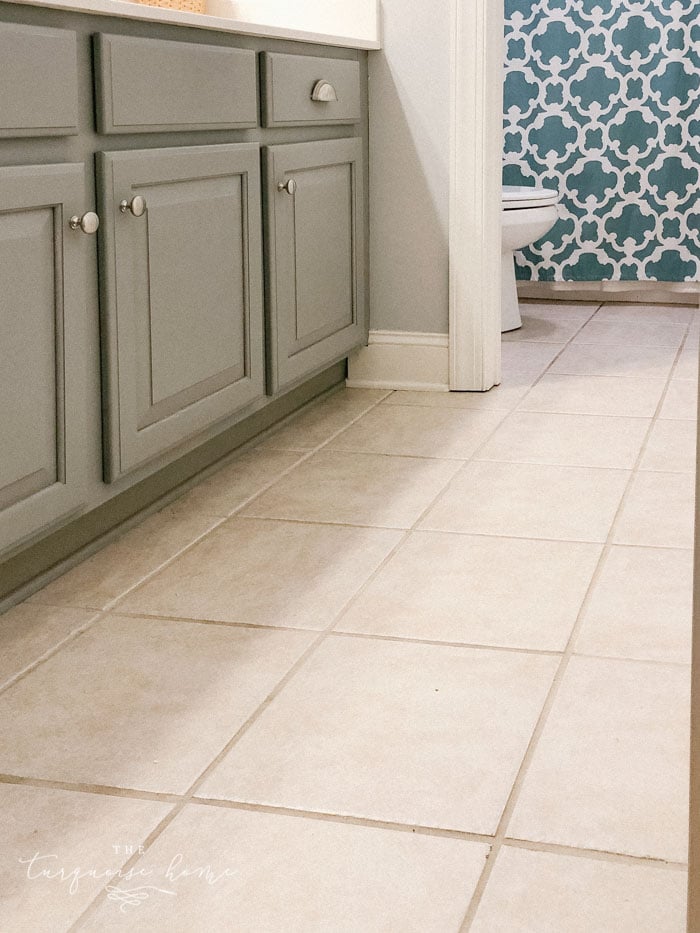 The girls' bathroom tile before peel & stick floor tiles.