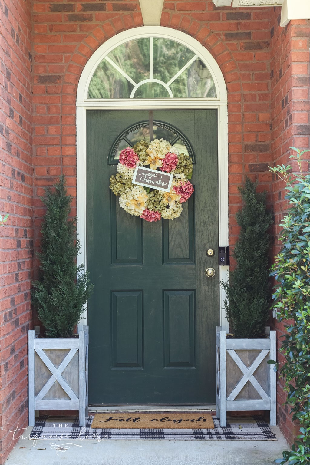 New planters with faux potted plants!