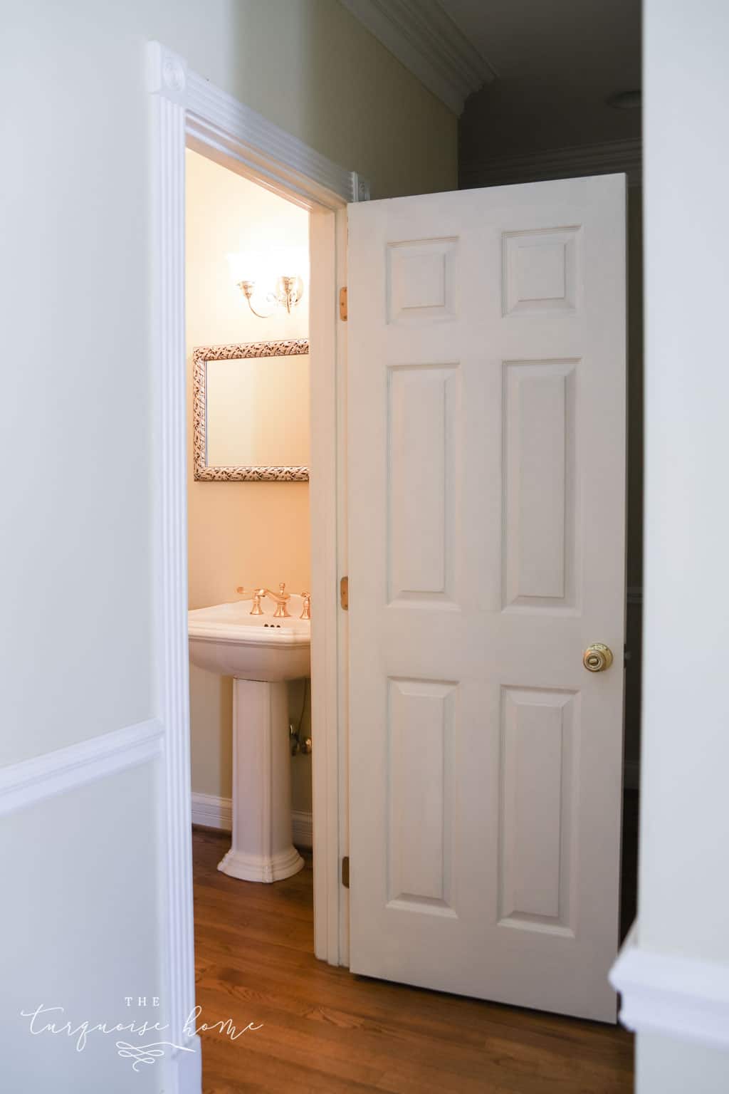 The powder bathroom in the hallway.
