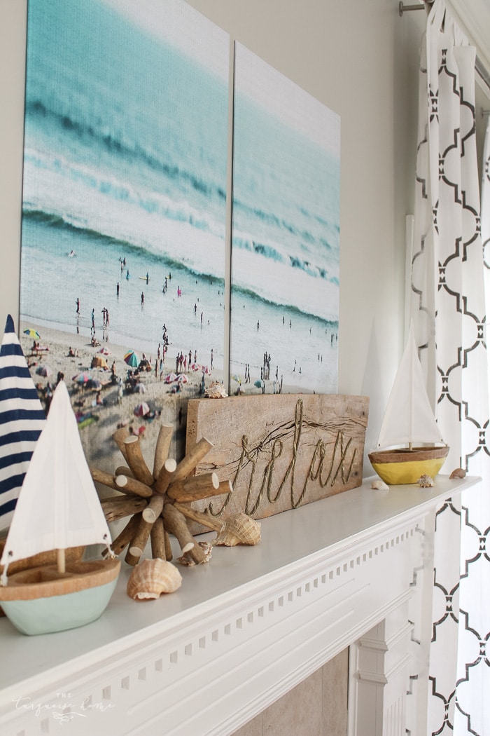 Art hanging on a fireplace mantle