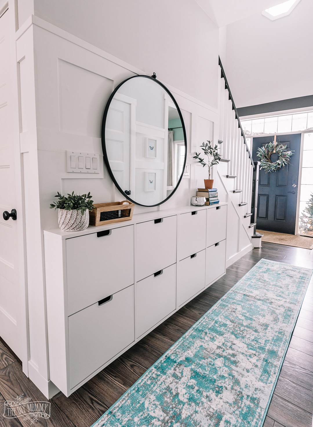 entryway hallway with narrow shoe storage