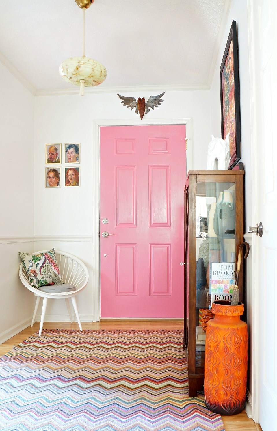 boho pink interior door in an entryway