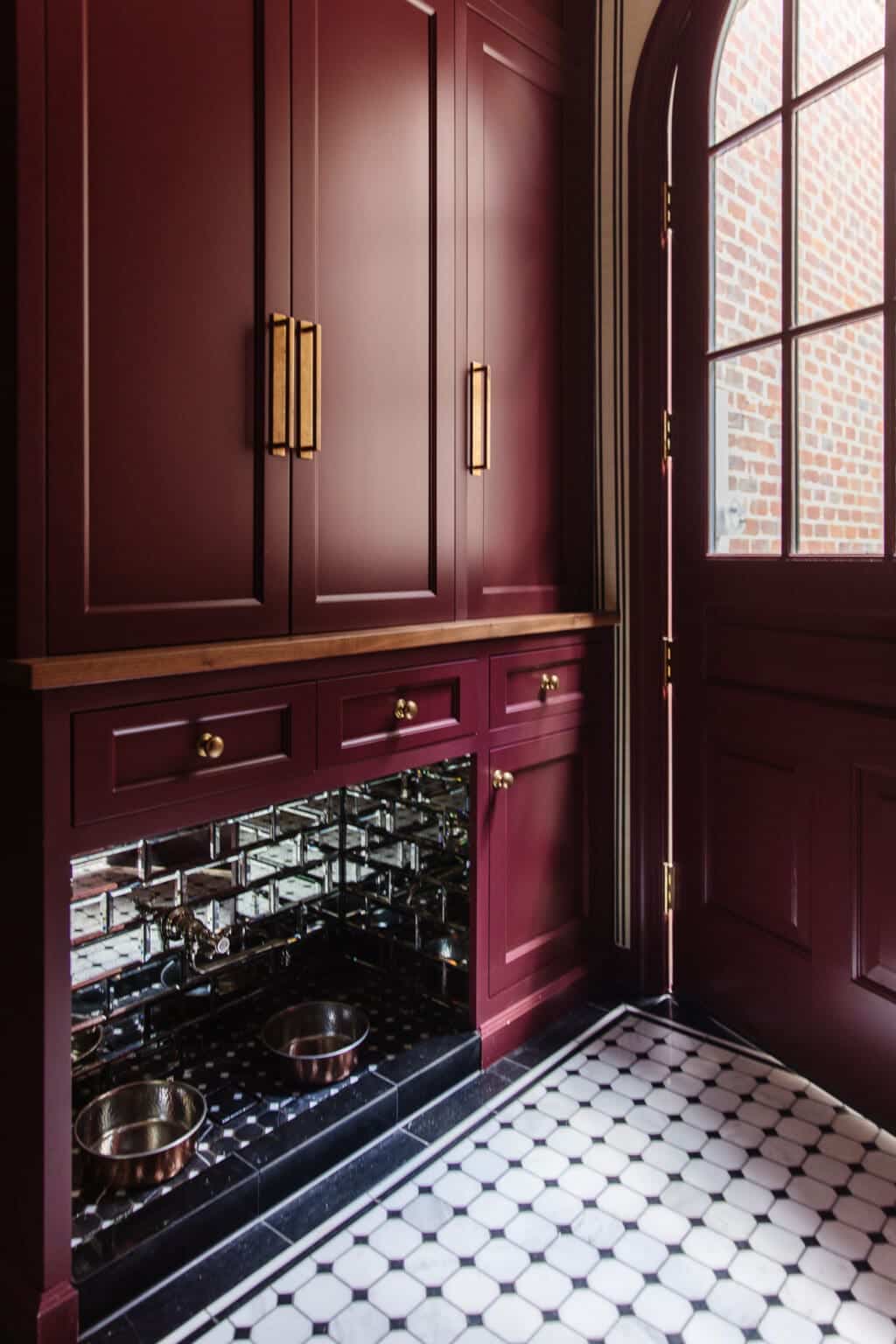 Preservation Red by Farrow & Ball painted door in a mudroom.