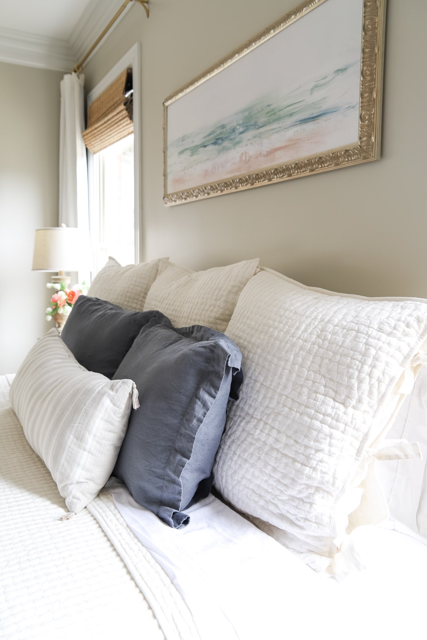 Layer Euro Pillows on the Bed