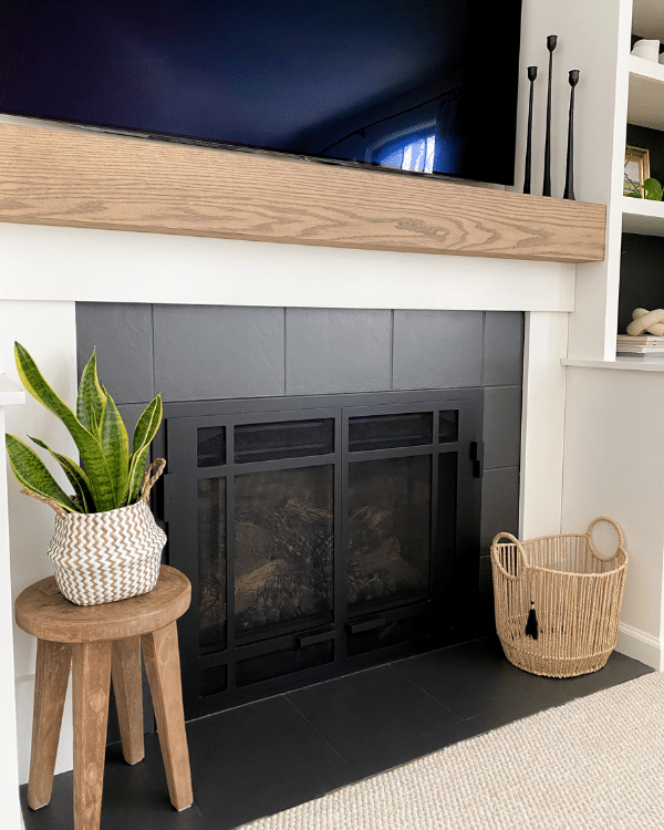 Black painted fireplace surround