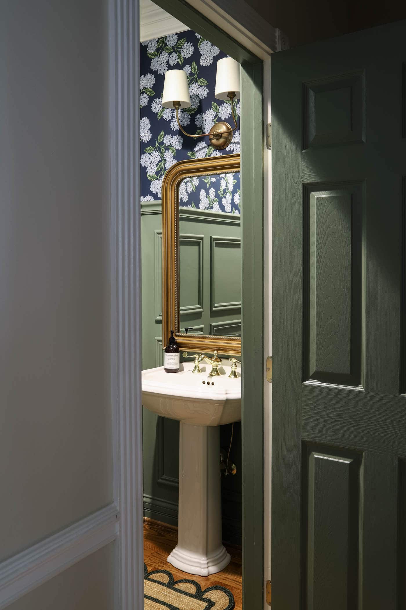 powder room door painted Calke Green by Farrow and Ball