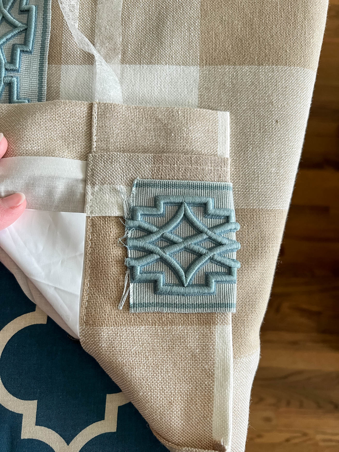 Fold the edge of trim tape over the top