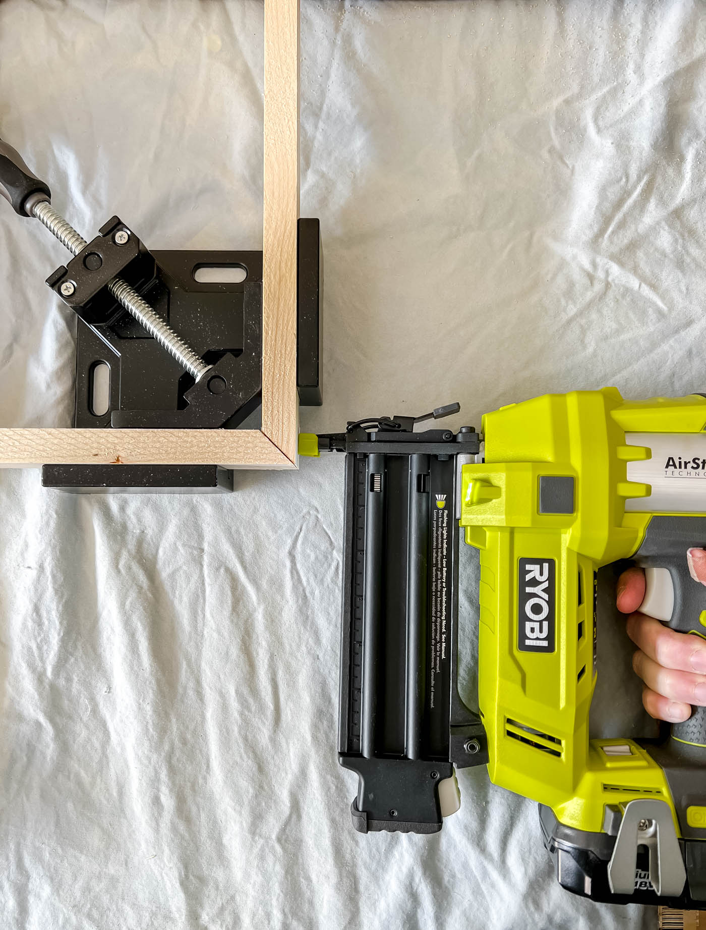 stapling the wood frame
