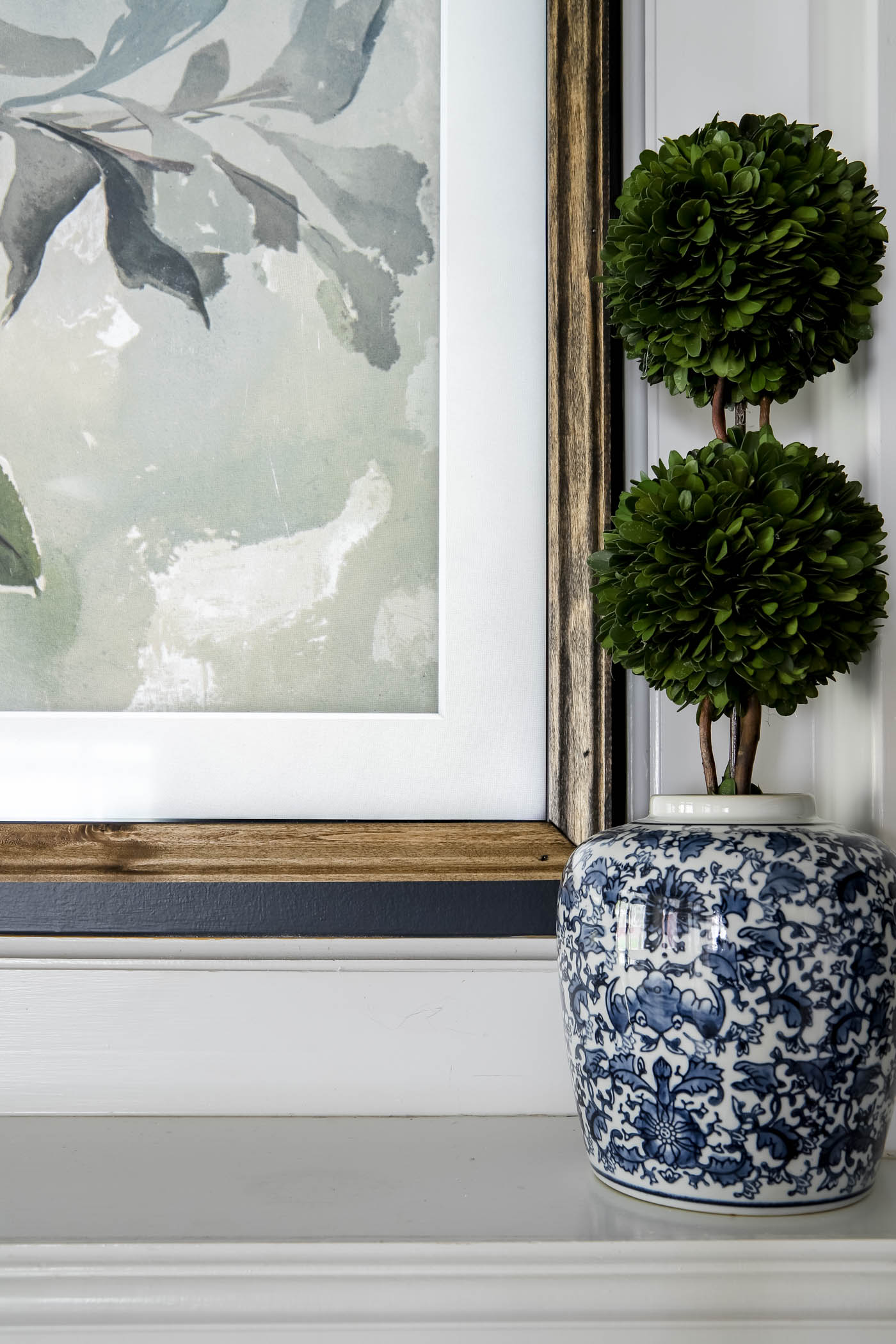 Chinoiserie pot with boxwood topiary