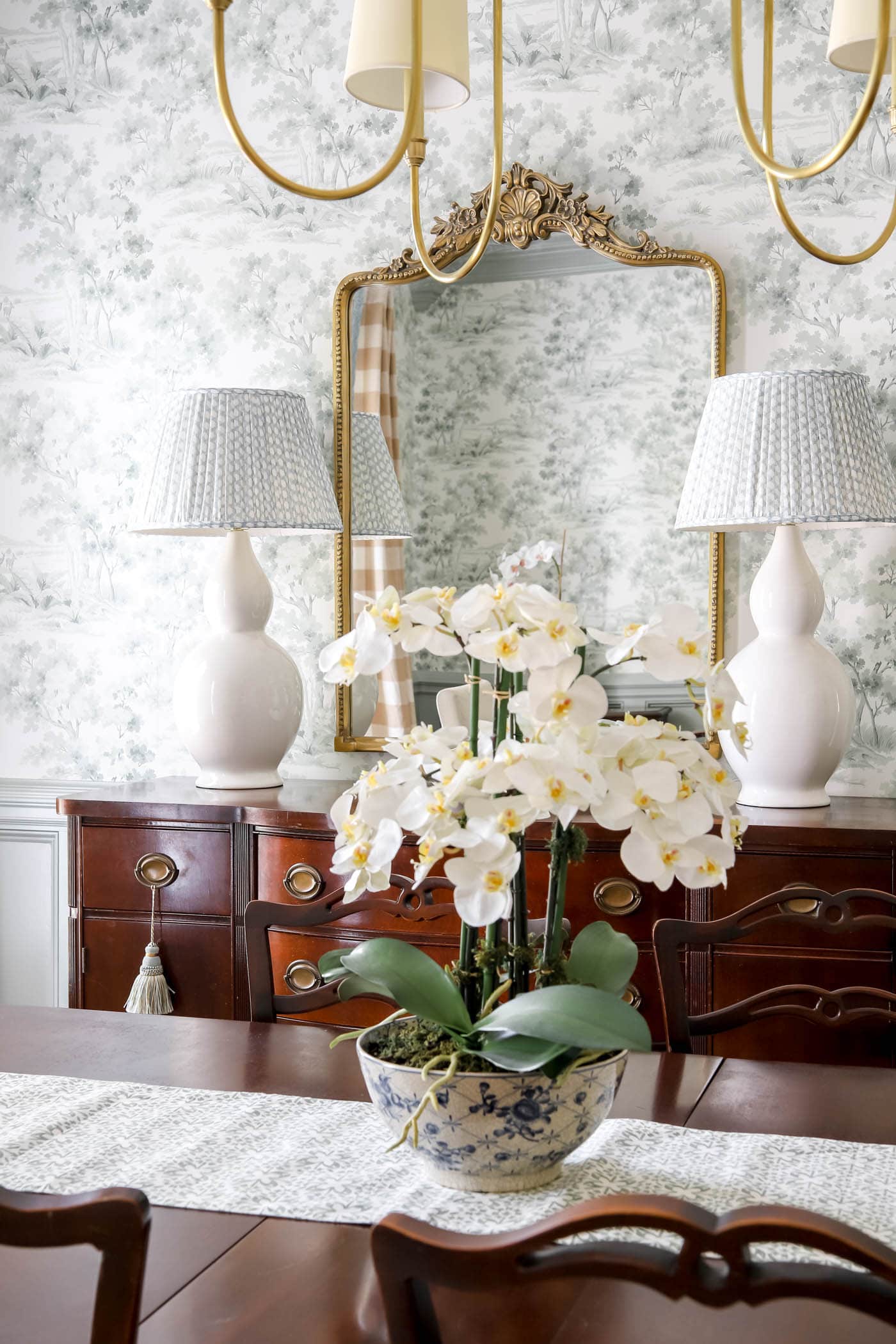 Faux orchid plant in dining room