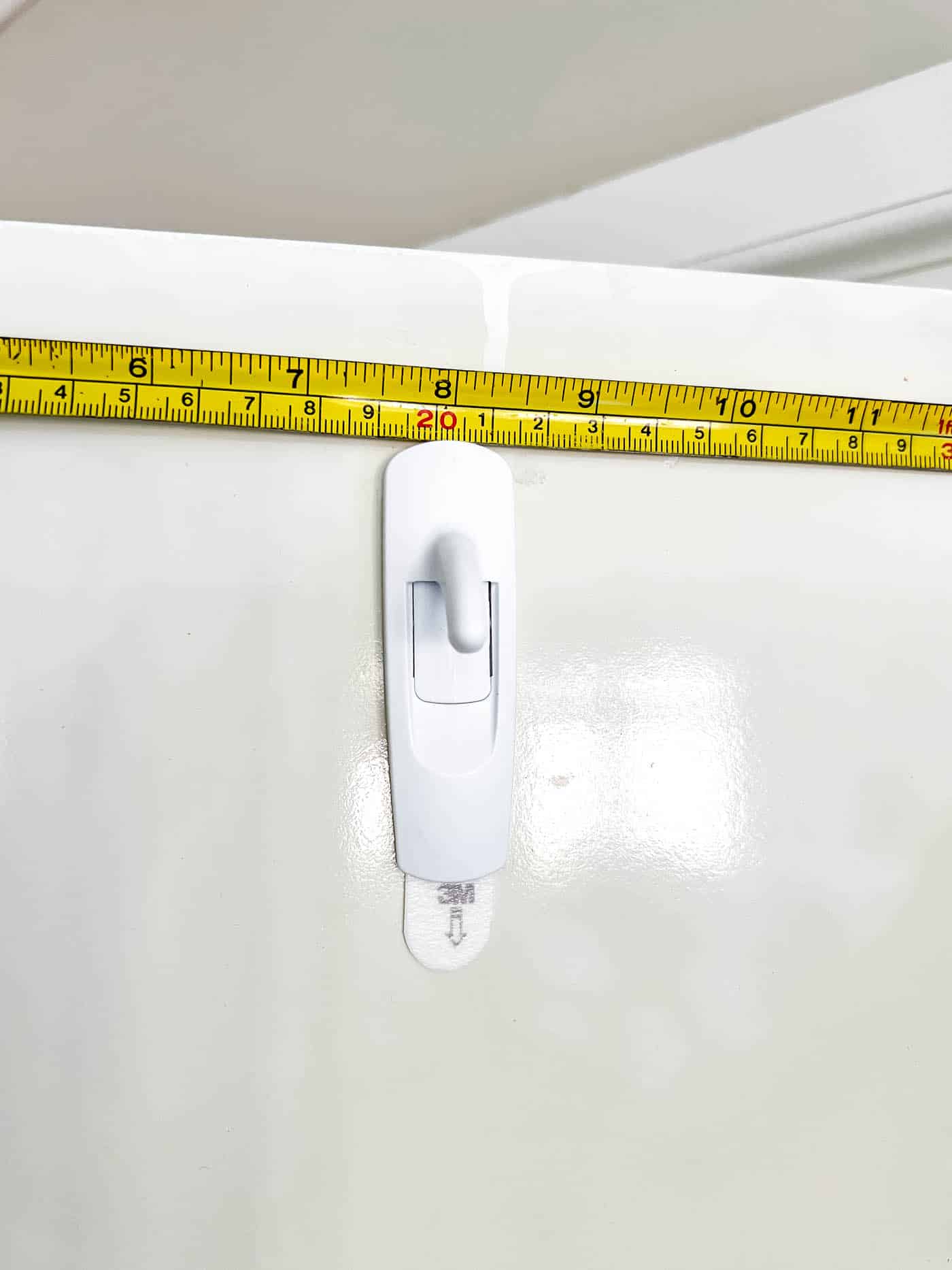 Command hook for cabinet wreath
