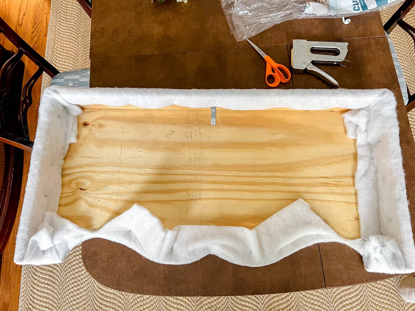 Attached filler to cornice board with staple gun
