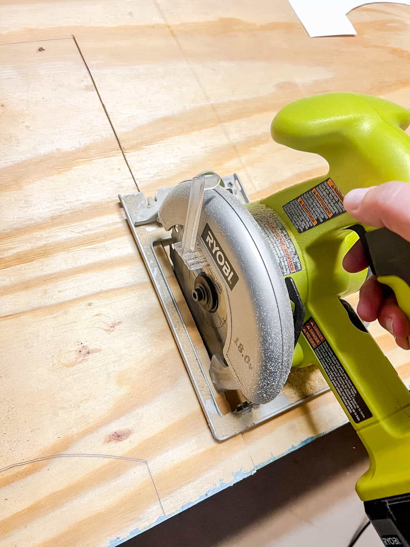 circular saw cutting a cornice board