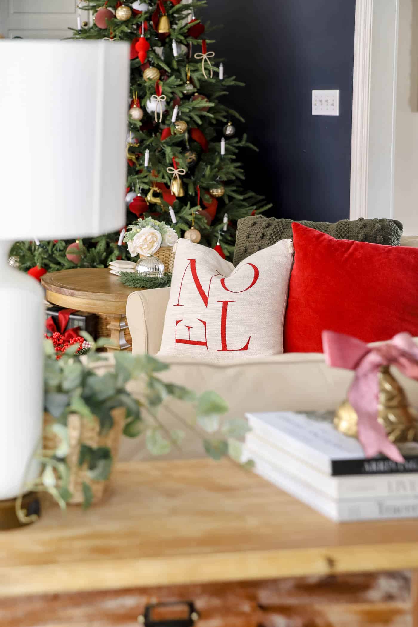 Noel red pillow on the sofa for red christmas decor