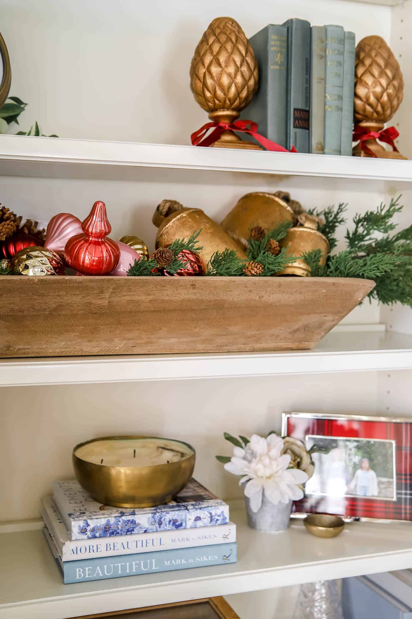 red Christmas decor on shelves
