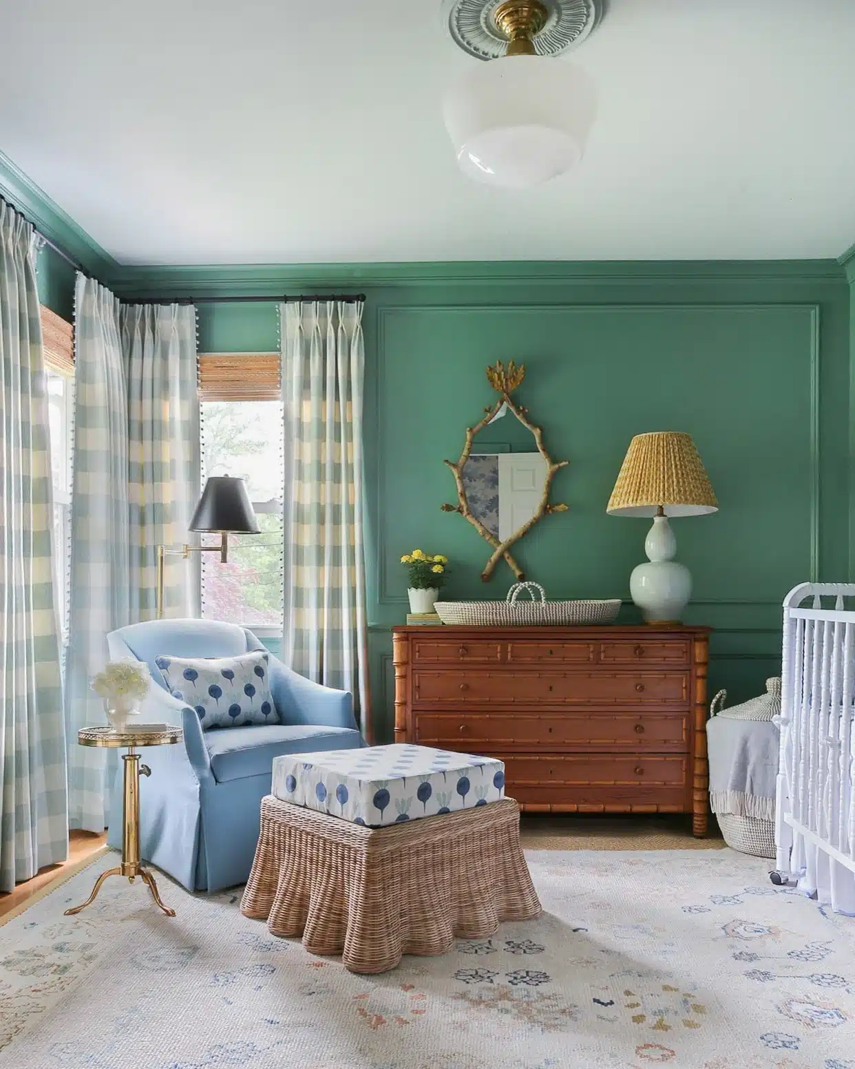 Lehigh Green nursery with blue chair and neutral window treatments.