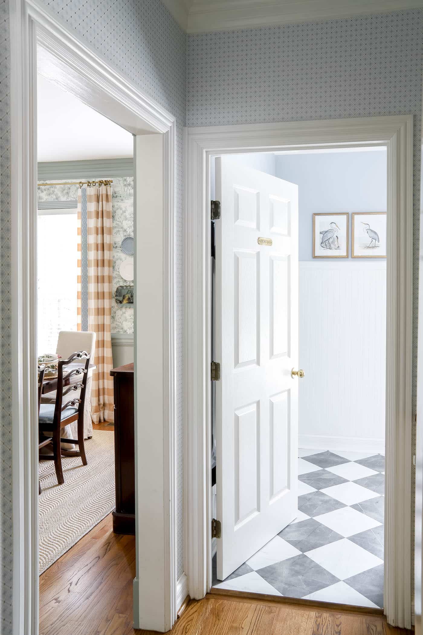 Butler's pantry view into a formal dining room and laundry room space.