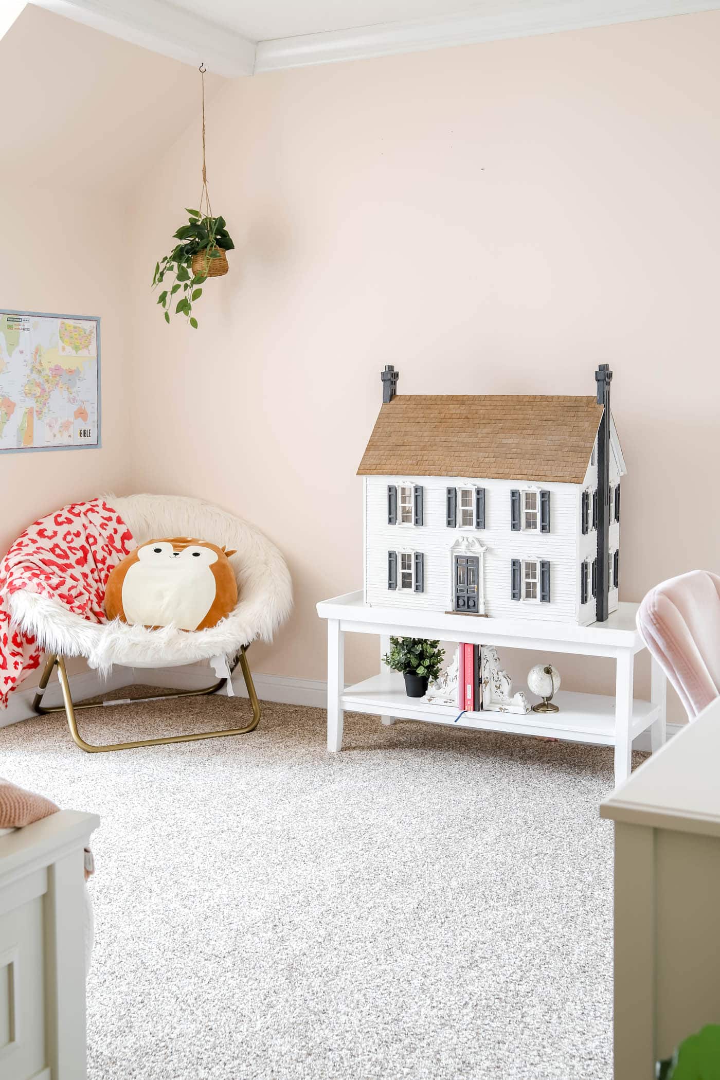 cozy chair in a pink teen room.
