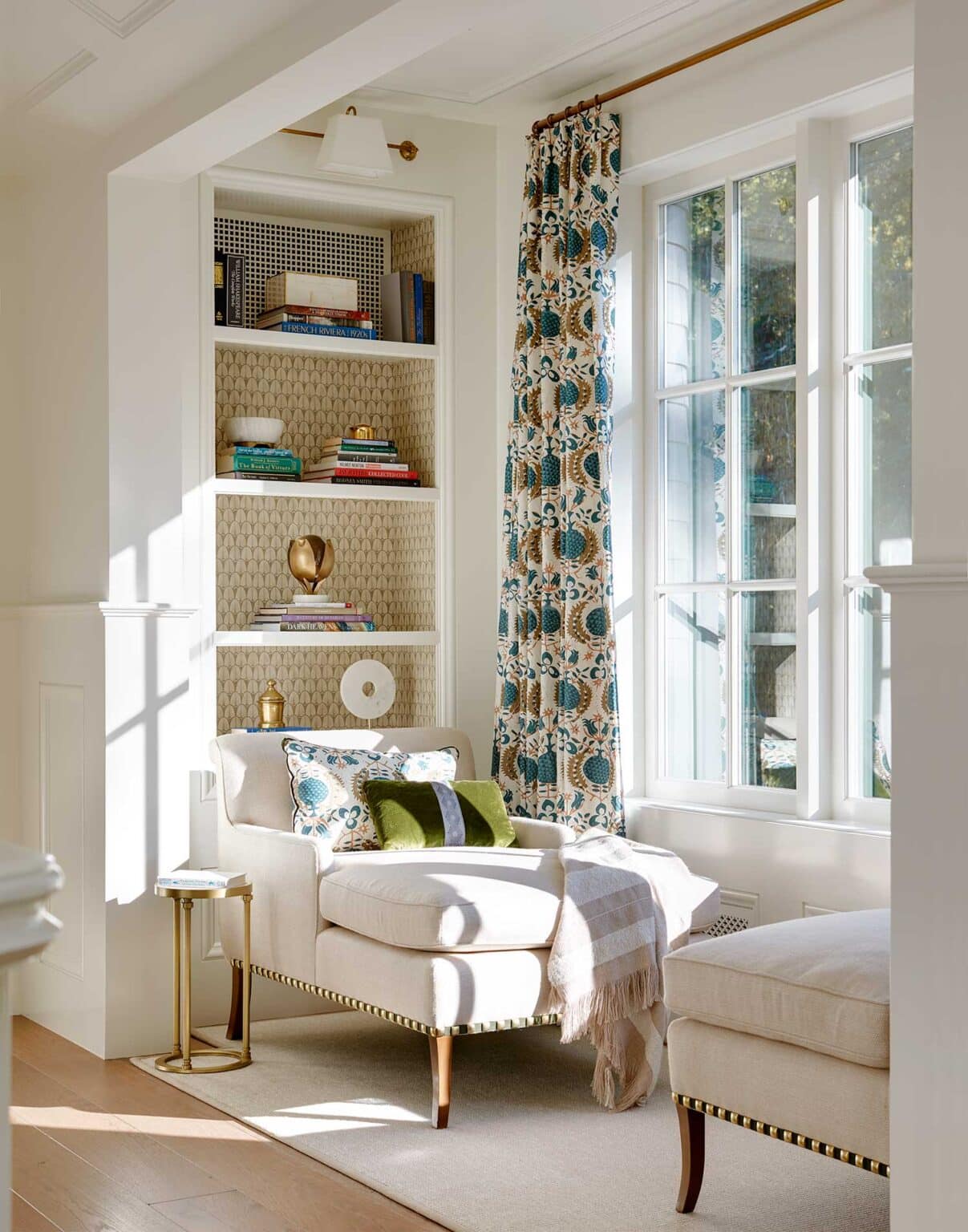 Cozy Up an Empty Corner with a comfy chair and built-in bookshelf for a reading corner.